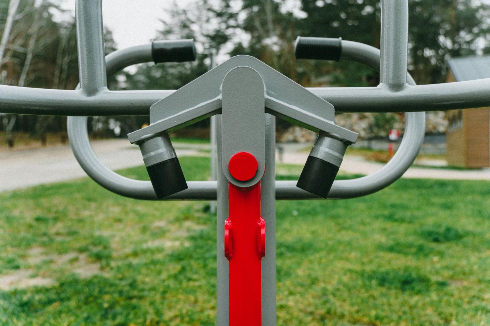 Outdoor Red Exercise Equipment in Polish Park