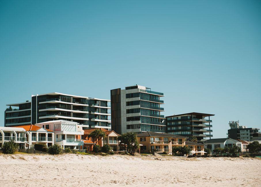 Buildings by Beach in Town